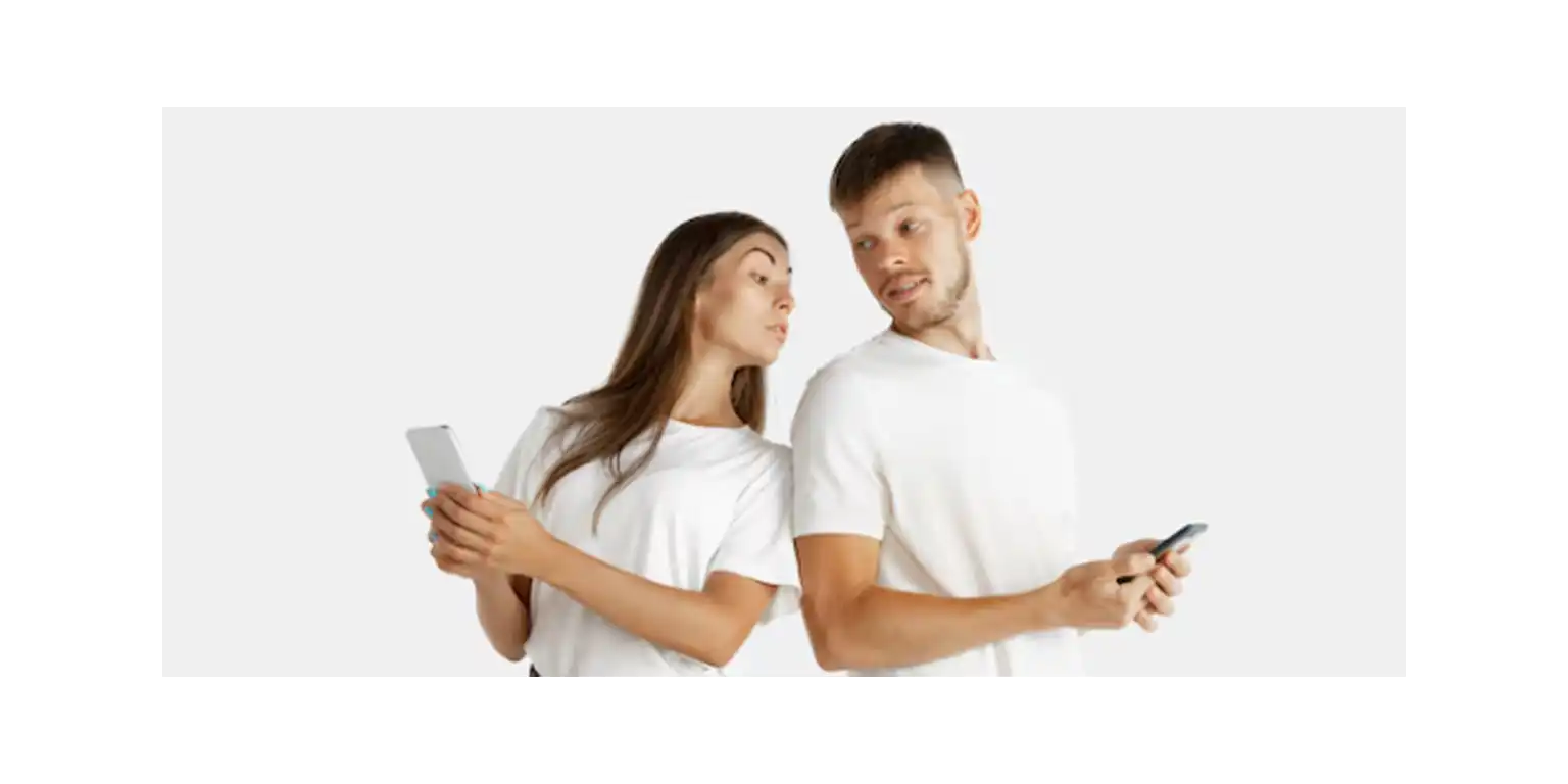 a boyfriend and a girlfriend arguing holding their phones