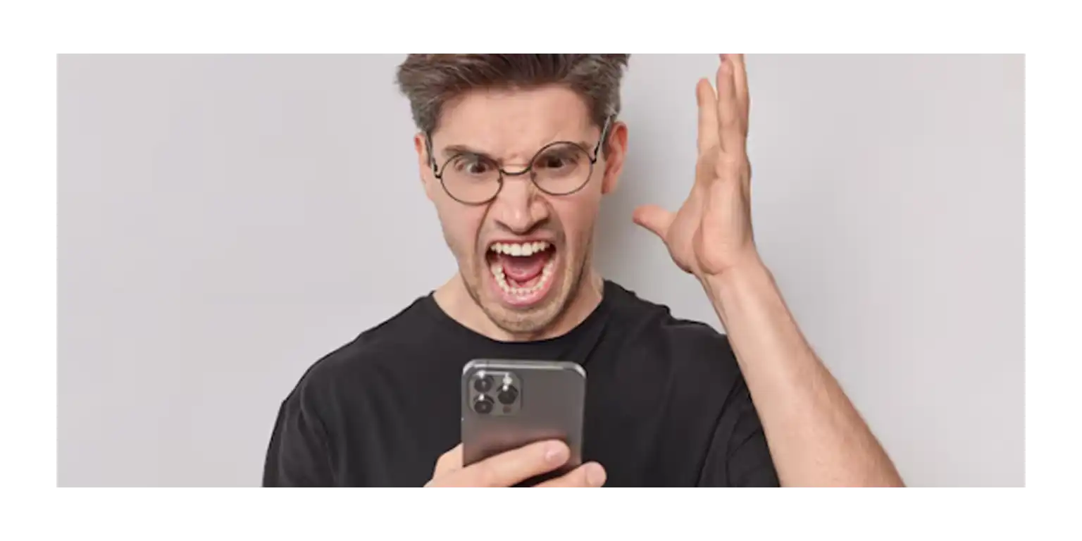 an irritated angry man uses his phone